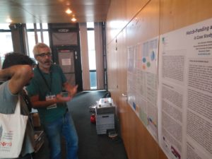 Ricard Espelt presenting his poster at the conference